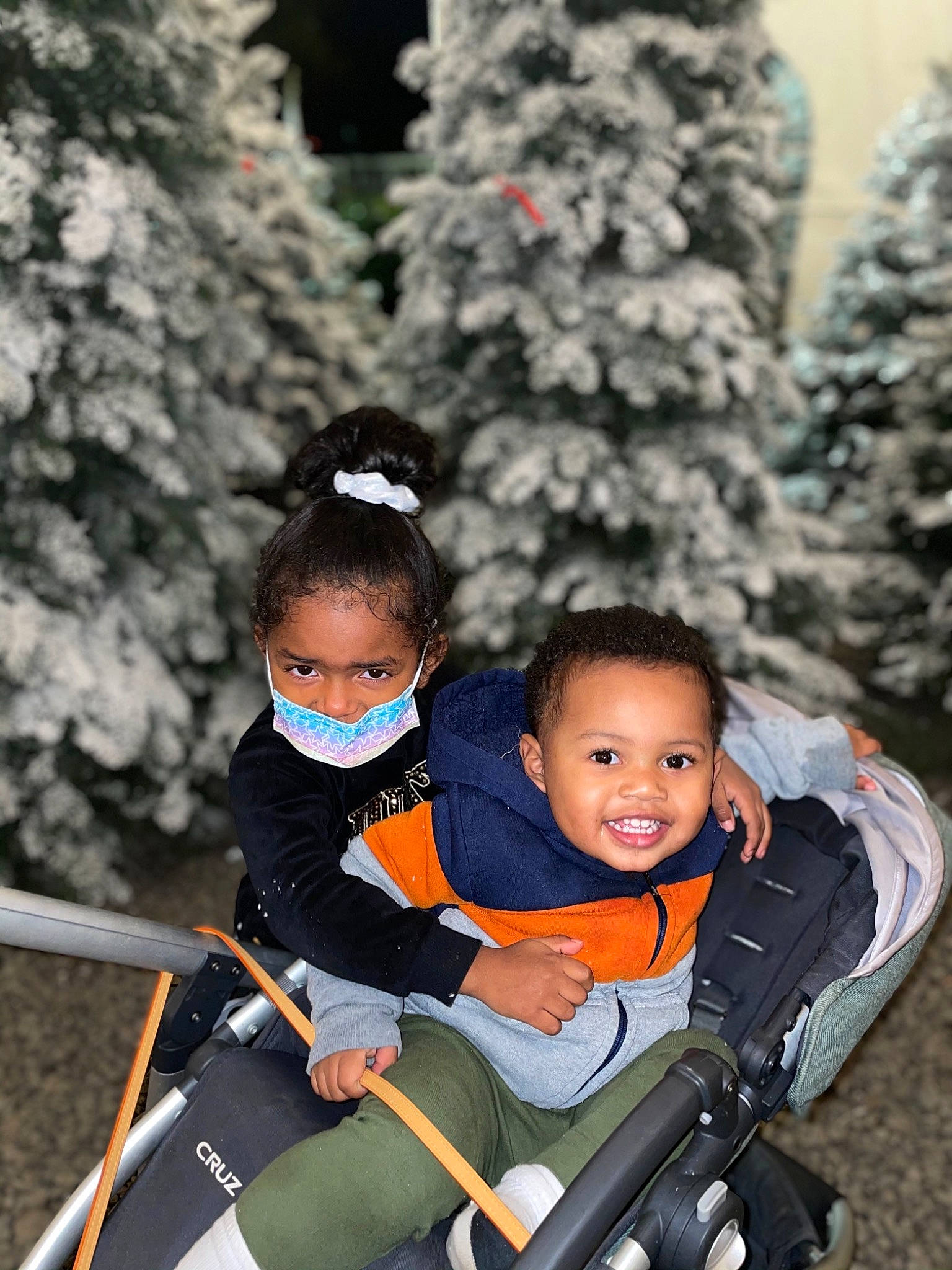 Nikolai is registered to the contest to win money with this photo: baby, baby_carriage, baby_products, baby_safety, baby_toddler_clothing, child, christmas_tree, comfort, conifer, fir, head, holiday, joy, lap, person, play, playing_with_kids, product, sitting, toddler