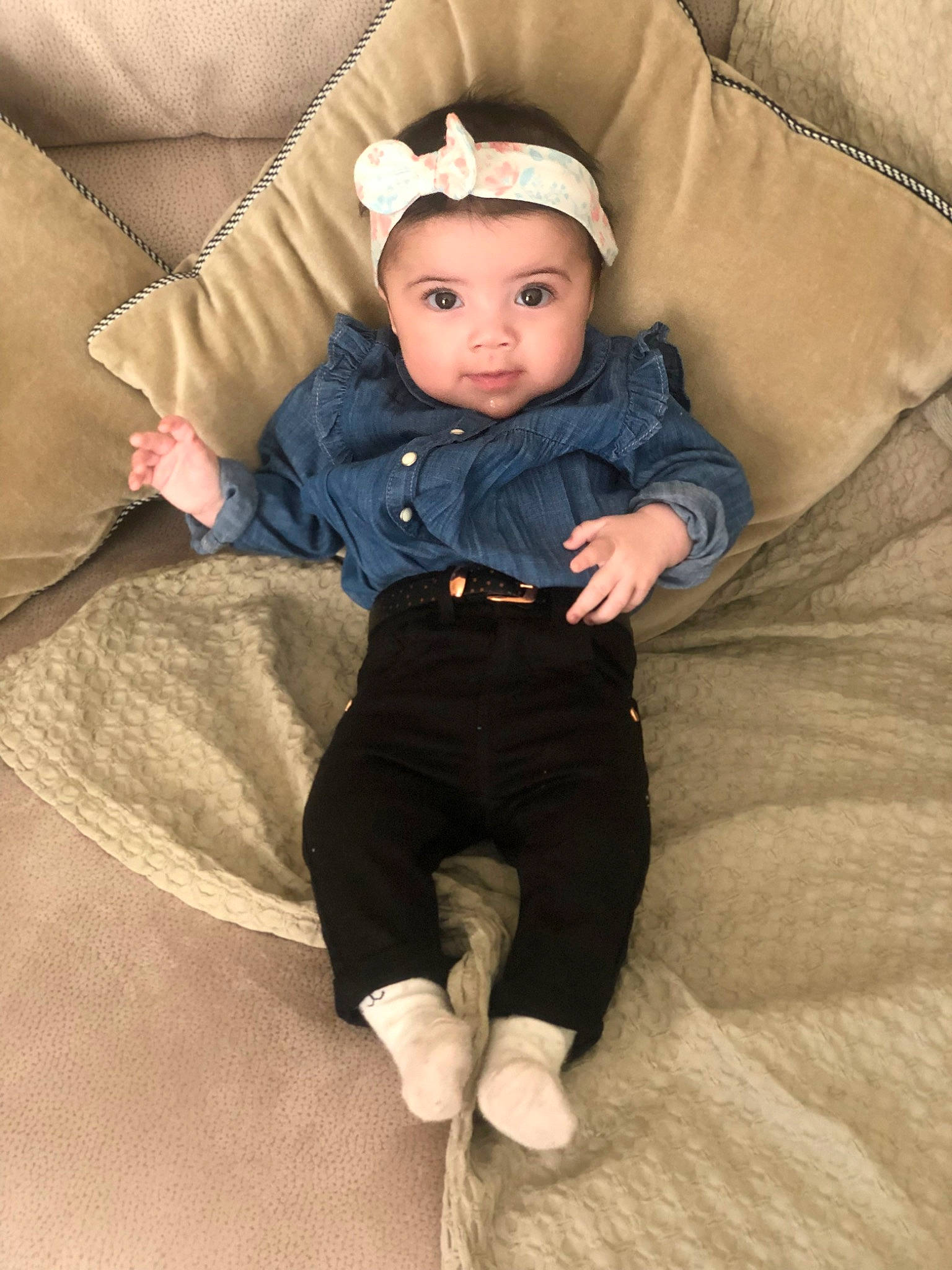 Sixtine participe au concours pour gagner de l'argent avec cette photo : baby, baby_toddler_clothing, cheek, comfort, couch, eye, face, flash_photography, flooring, hat, head, headwear, jacket, leg, linens, outerwear, person, skin, sleeve, textile