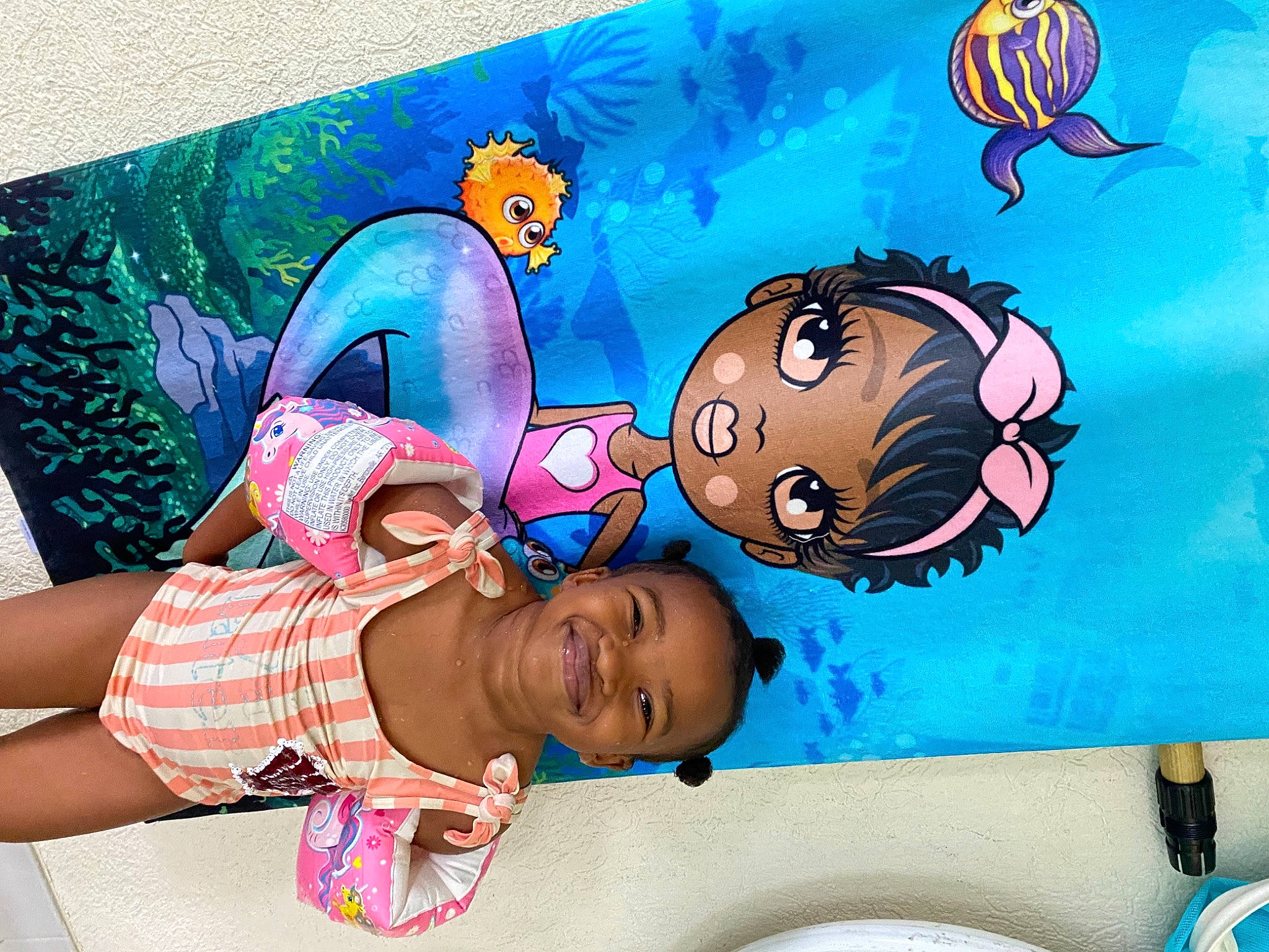 Amoni is registered to the contest to win money with this photo: art, blue, child, design, drawing, event, facial_expression, fun, happy, hat, illustration, joy, leisure, paint, painting, person, pink, smile, snapshot, summer