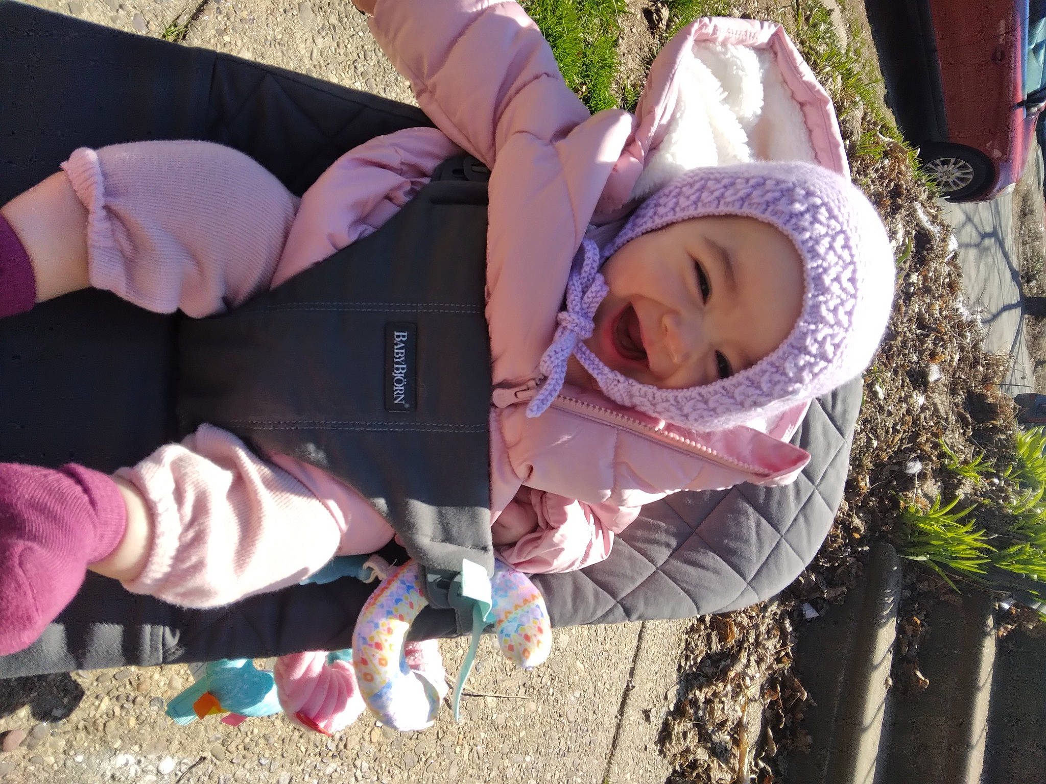 Juliana joined the competition — help win amazing prizes! baby, baby_products, baby_toddler_clothing, child, fun, grass, green, hand, happy, hat, headwear, lap, leisure, people_in_nature, person, pink, plant, recreation, sitting, spring