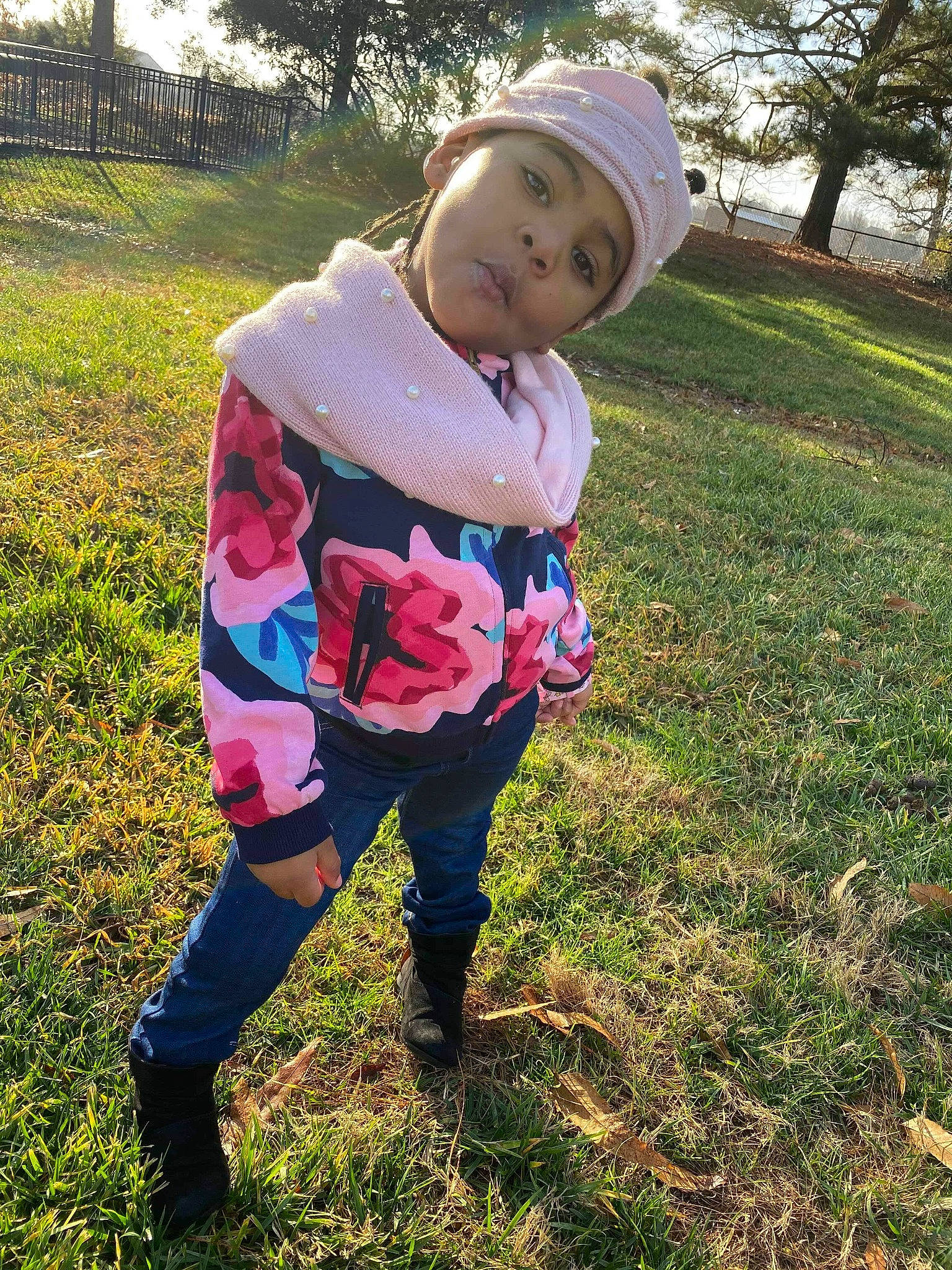 Dezire is registered to the contest to win money with this photo: child, grass, headgear, headwear, outerwear, pattern, person, pink, plant, spring, t_shirt, toddler, tree