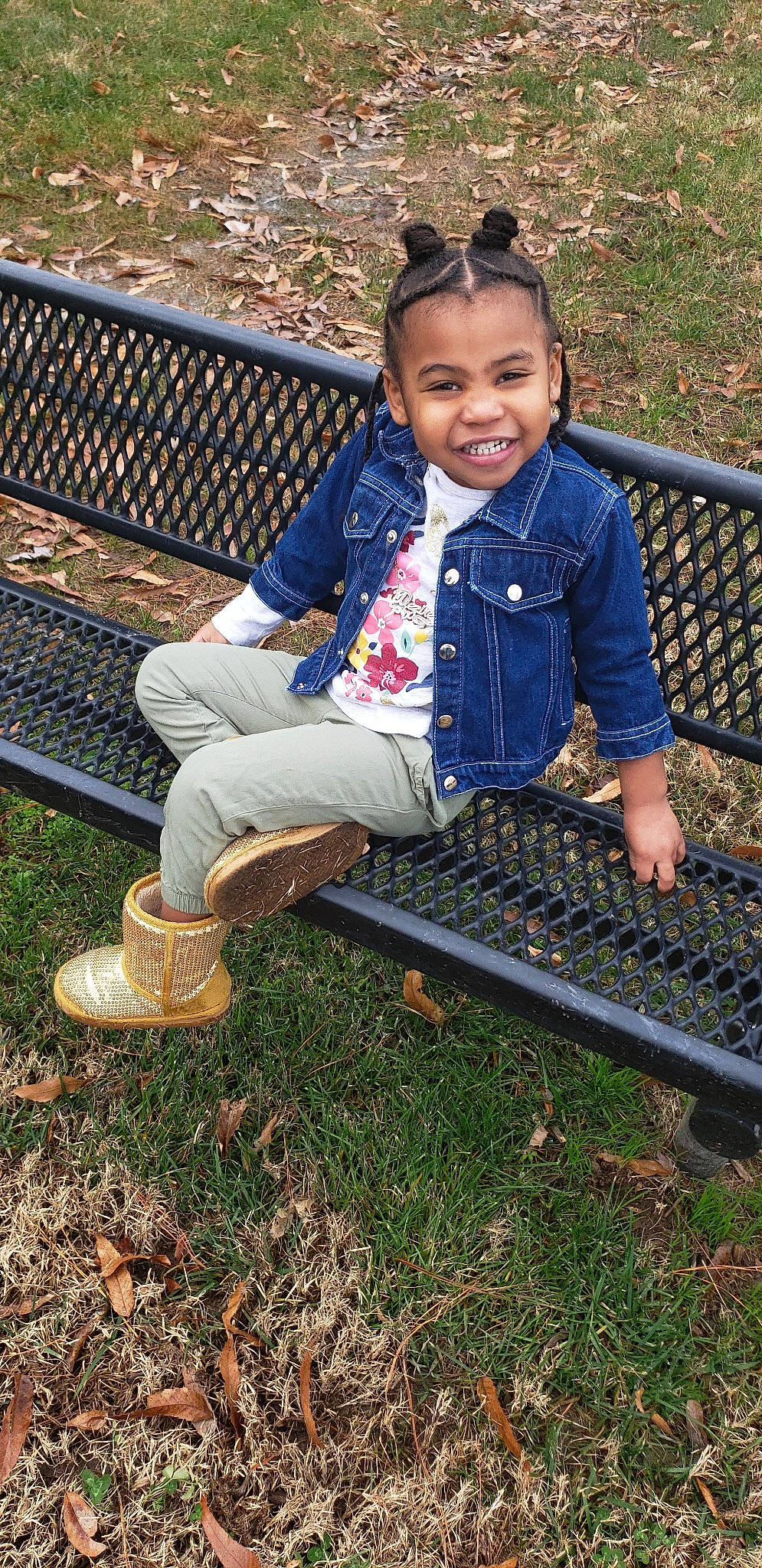 Dezire is registered to the contest to win money with this photo: child, denim, grass, joy, person, plant, play, sitting, smile, soil, toddler