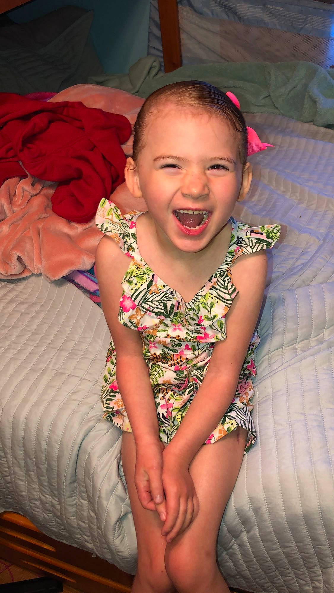 Aleeha is registered to the contest to win money with this photo: cheek, child, face, facial_expression, fun, happy, head, joy, laugh, leg, mouth, nose, person, sitting, skin, smile, thigh, toddler, vacation