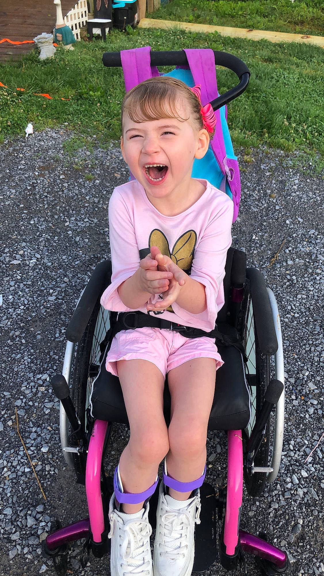 Aleeha is registered to the contest to win money with this photo: baby_carriage, baby_products, child, fun, leg, person, pink, play, playground, product, sitting, smile, thigh, toddler