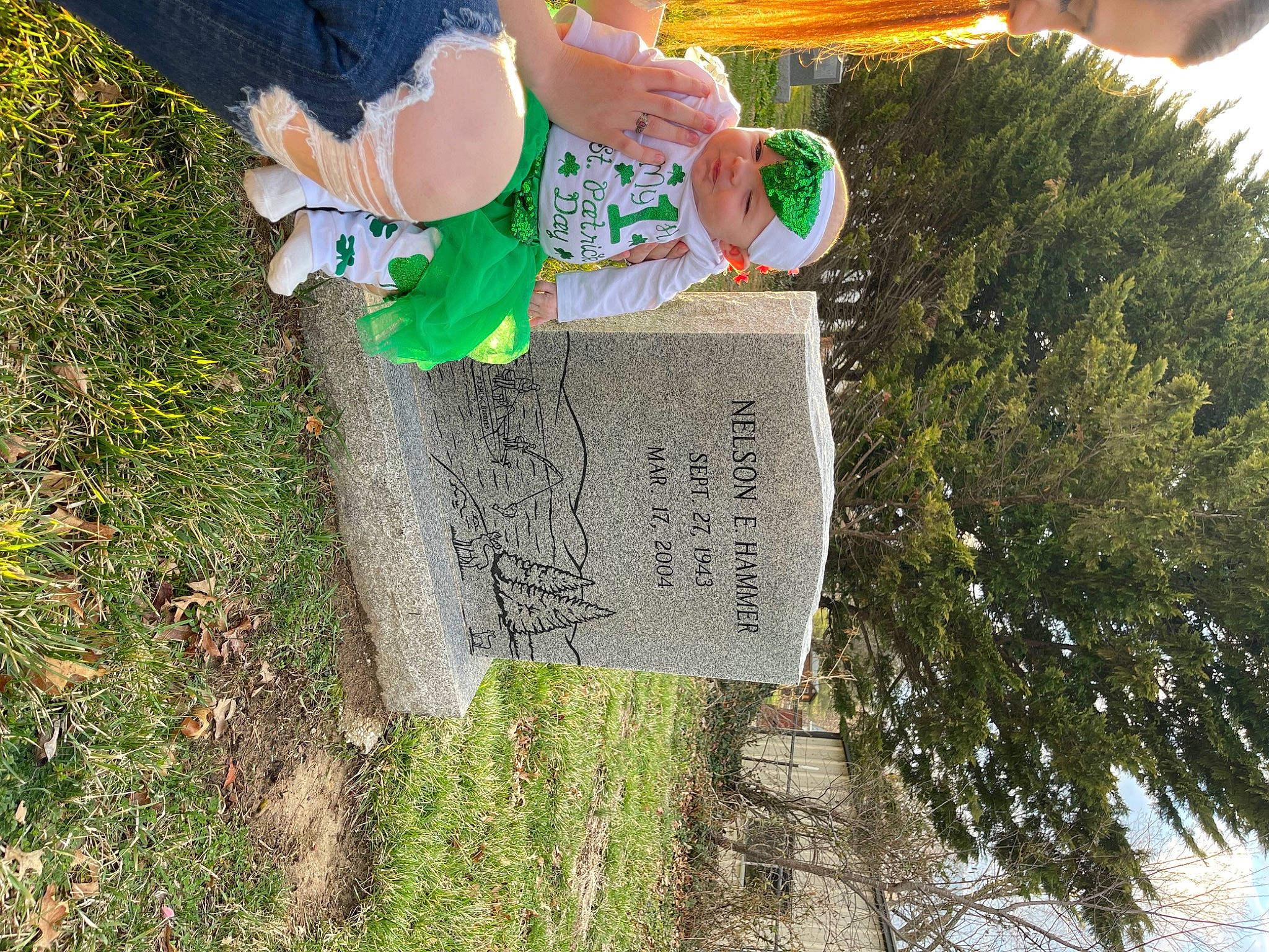 Hazleigh is registered to the contest to win money with this photo: adaptation, cemetery, grass, grass_family, grave, green, groundcover, happy, hat, headstone, headwear, leaf, light, morning, nature, people_in_nature, person, plant, sky, tree