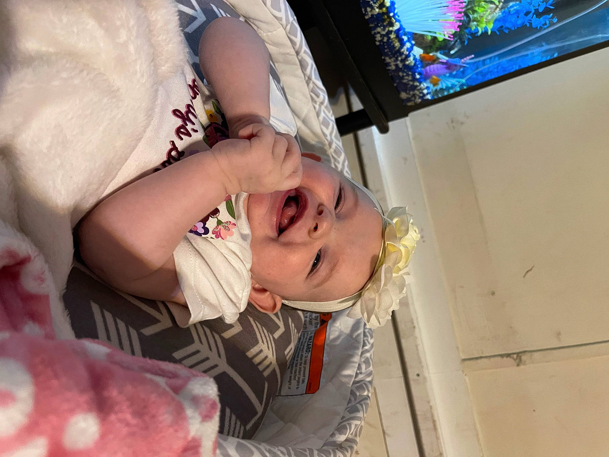Hazleigh joined the competition — help win amazing prizes! baby, child, comfort, display_device, dress, event, flat_panel_display, flesh, fun, gesture, happy, headwear, led_backlit_lcd_display, leisure, person, room, sitting, television, television_set, toddler