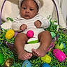 baby, bunny_ears, basket, easter_eggs, green_grass, colorful, infant, cute, indoors, holiday, festive, toy_eggs, foot, hands, white_clothing, decorative, celebration, child, portrait, seasonal