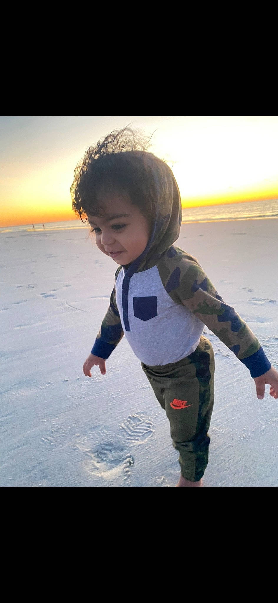 Braedyn joined the competition — help win amazing prizes! cool, electric_blue, flash_photography, fun, gesture, happy, horizon, landscape, morning, people_in_nature, person, recreation, sand, sky, sleeve, smile, sunlight, toddler, travel, water