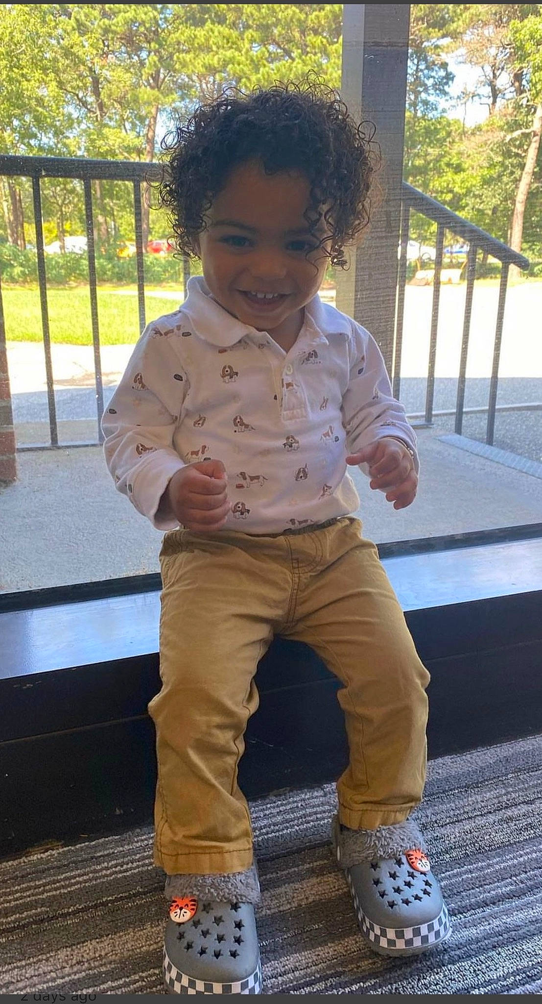 Braedyn is registered to the contest to win money with this photo: child, cool, denim, fence, fun, gesture, grass, happy, human_leg, joy, leisure, people_in_nature, person, plant, play, sitting, sleeve, smile, snapshot, summer