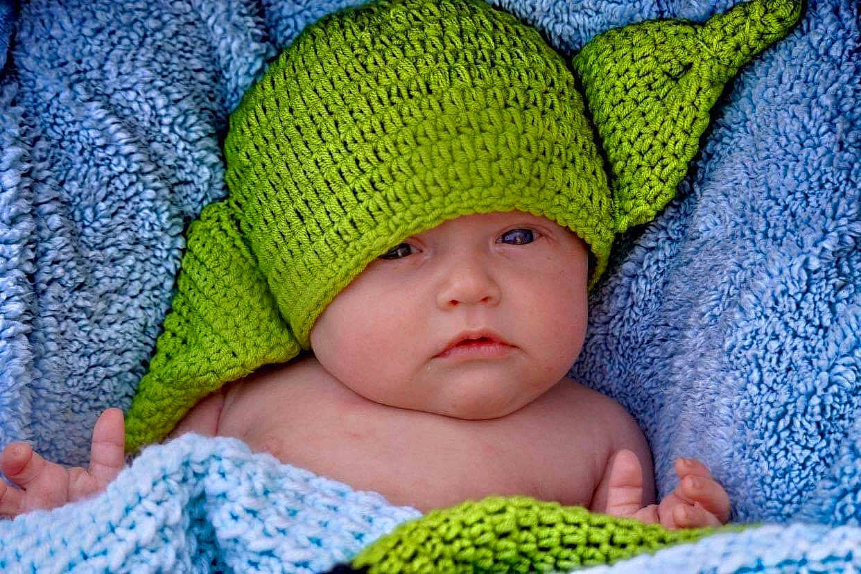 Dylan Jr is registered to the contest to win money with this photo: azure, baby, baby_sleeping, baby_toddler_clothing, blue, cap, cheek, comfort, green, headgear, headwear, knit_cap, linens, organ, pattern, person, product, skin, textile, toddler
