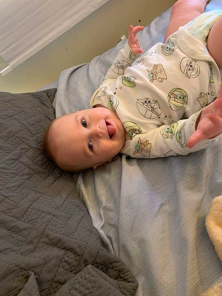 Dylan Jr joined the competition — help win amazing prizes! baby, baby_products, baby_sleeping, baby_toddler_clothing, cheek, child, comfort, finger, flooring, gesture, head, human_body, leg, linens, mouth, neck, nose, person, skin, sleeve