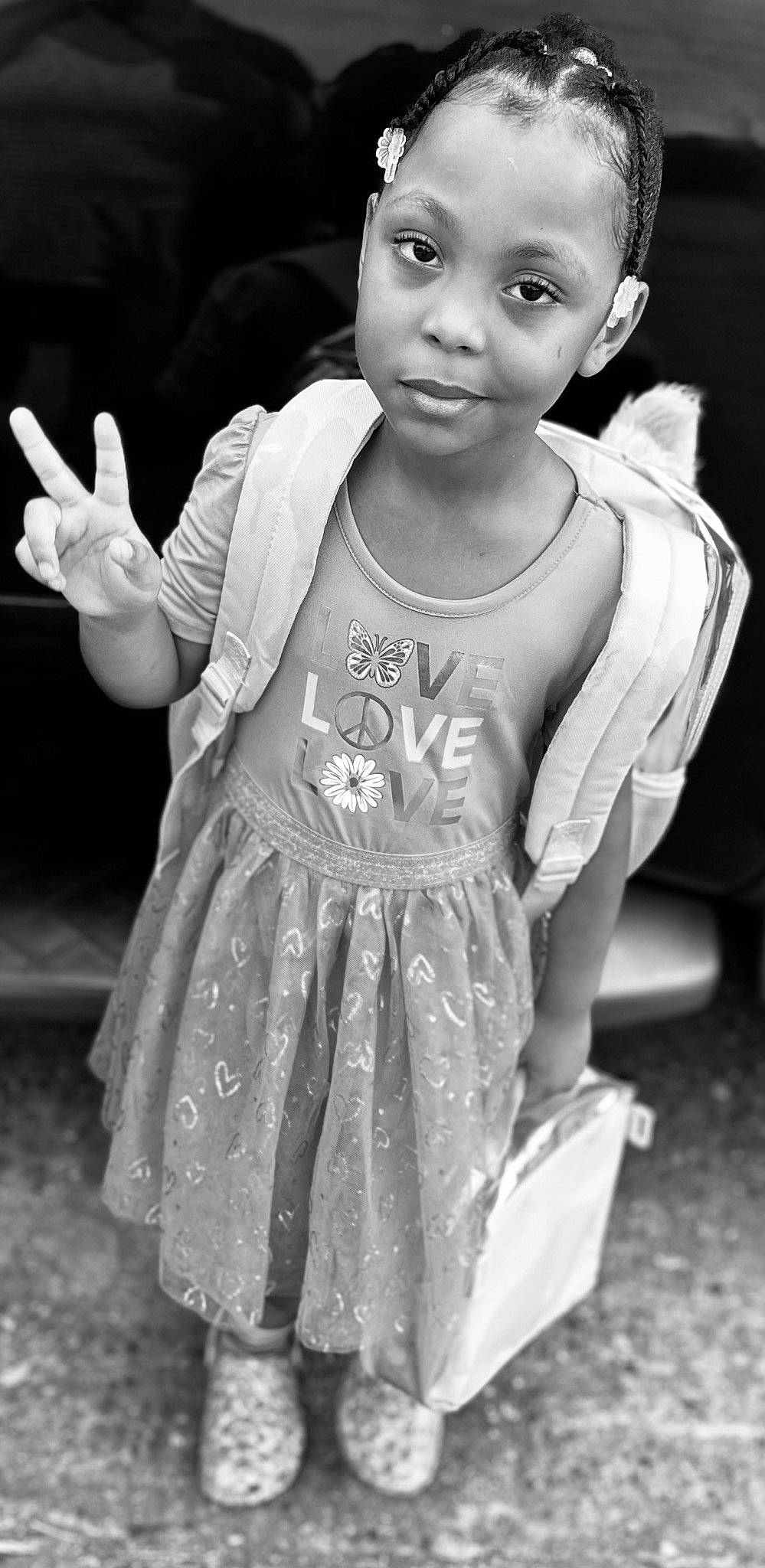 Arya joined the competition — help win amazing prizes! baby_toddler_clothing, black, black_and_white, clothing, cool, eye, facial_expression, flash_photography, gesture, hand, happy, head, organ, person, photograph, skin, sleeve, standing, style, toddler