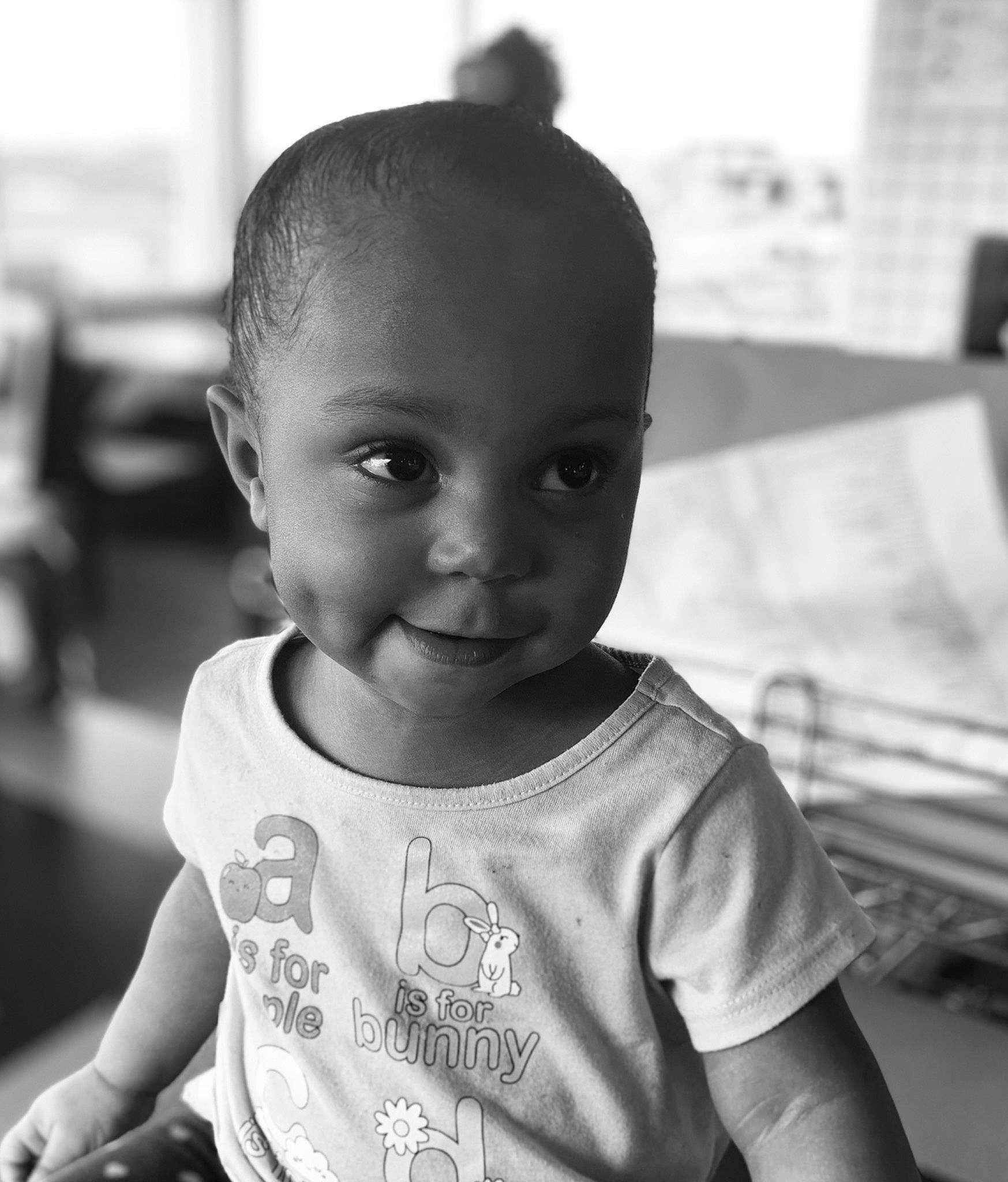 Naila joined the competition — help win amazing prizes! arm, black, black_and_white, cheek, child, chin, cool, flash_photography, hairstyle, happy, iris, monochrome, monochrome_photography, person, photograph, skin, sleeve, smile, standing, style