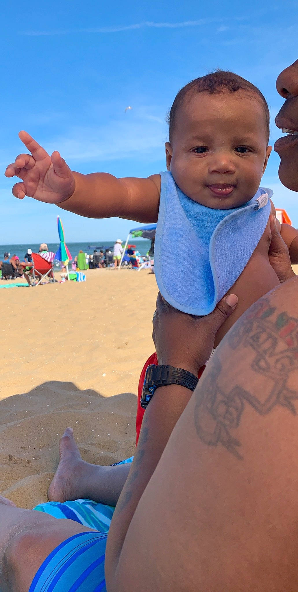 Jaidyn joined the competition — help win amazing prizes! arm, baby, beach, blue, child, elbow, fun, leg, person, play, sand, sea, smile, summer, sun_tanning, toddler, tourism, undergarment, vacation
