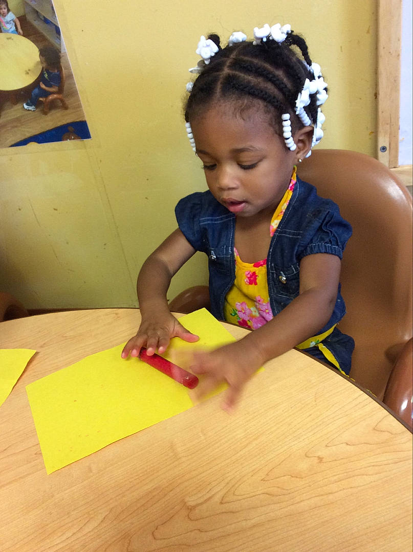 Jaydynn West joined the competition — help win amazing prizes! child, cornrows, hair_accessory, hairstyle, headband, person, play, skin, toddler, wood, yellow