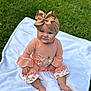baby, child, outdoor, grass, blanket, bow, headband, peach, cute, ruffles, pumpkin, clothing, sitting, infant, person, portrait, smile, nature, soft, happy