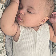 Aaron participe au concours pour gagner de l'argent avec cette photo : baby, sleeping, infant, blanket, patterned, cozy, arm, face, peaceful, soft, clothing, child, cushion, resting, cute, skin, newborn, portrait, indoors, comfort