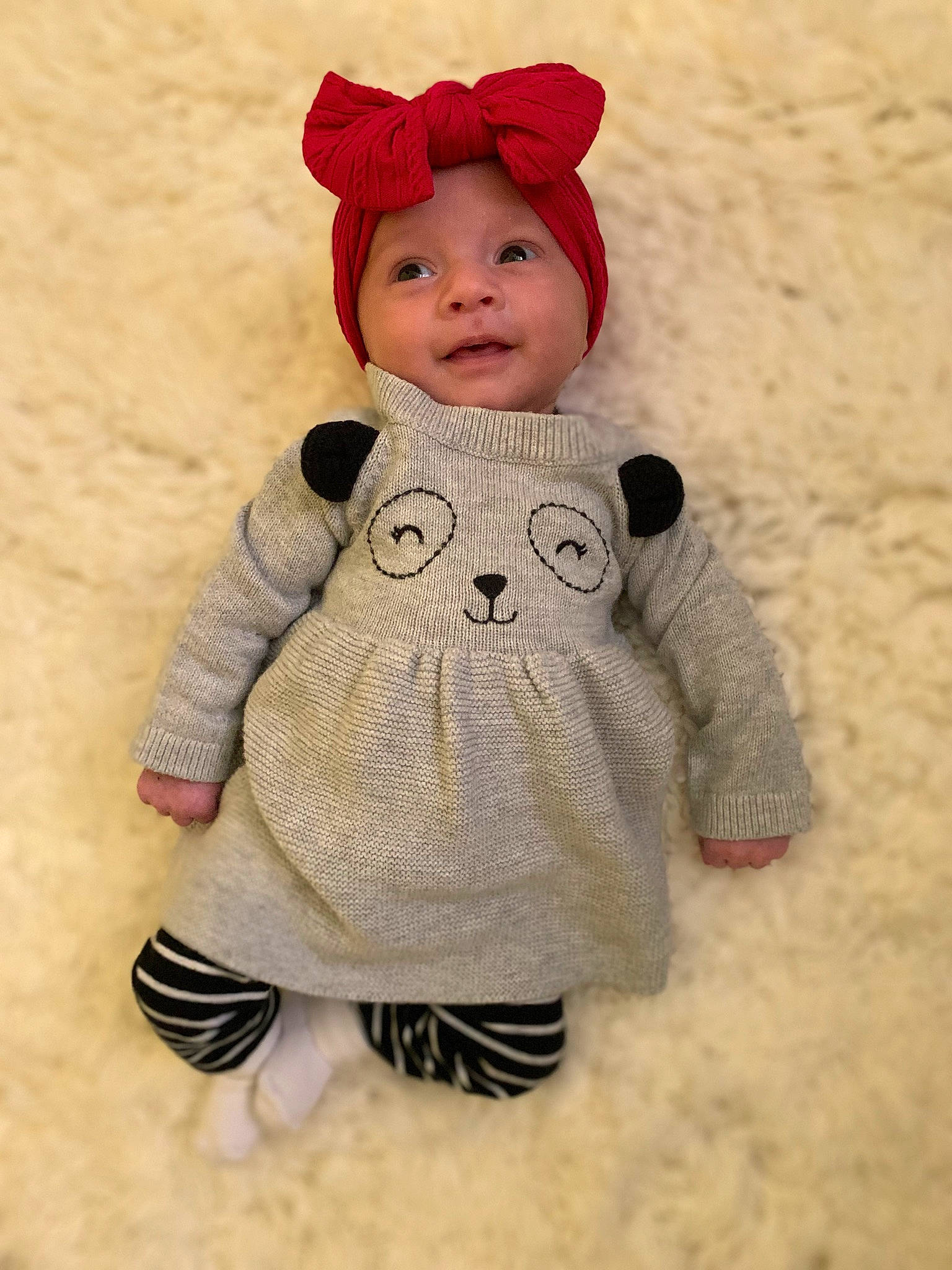 Abriella is registered to the contest to win money with this photo: art, baby, baby_toddler_clothing, cap, clothing, creative_arts, doll, face, happy, headgear, headwear, outerwear, pattern, person, skin, sleeve, smile, textile, toddler, toy