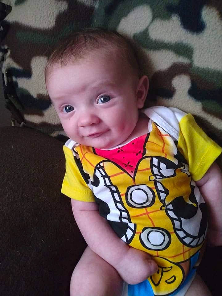 Braxton is registered to the contest to win money with this photo: baby, baby_toddler_clothing, cheek, chin, cool, dress, eye, eyebrow, finger, forehead, hair, happy, human_body, iris, lip, mouth, nose, person, skin, sleeve