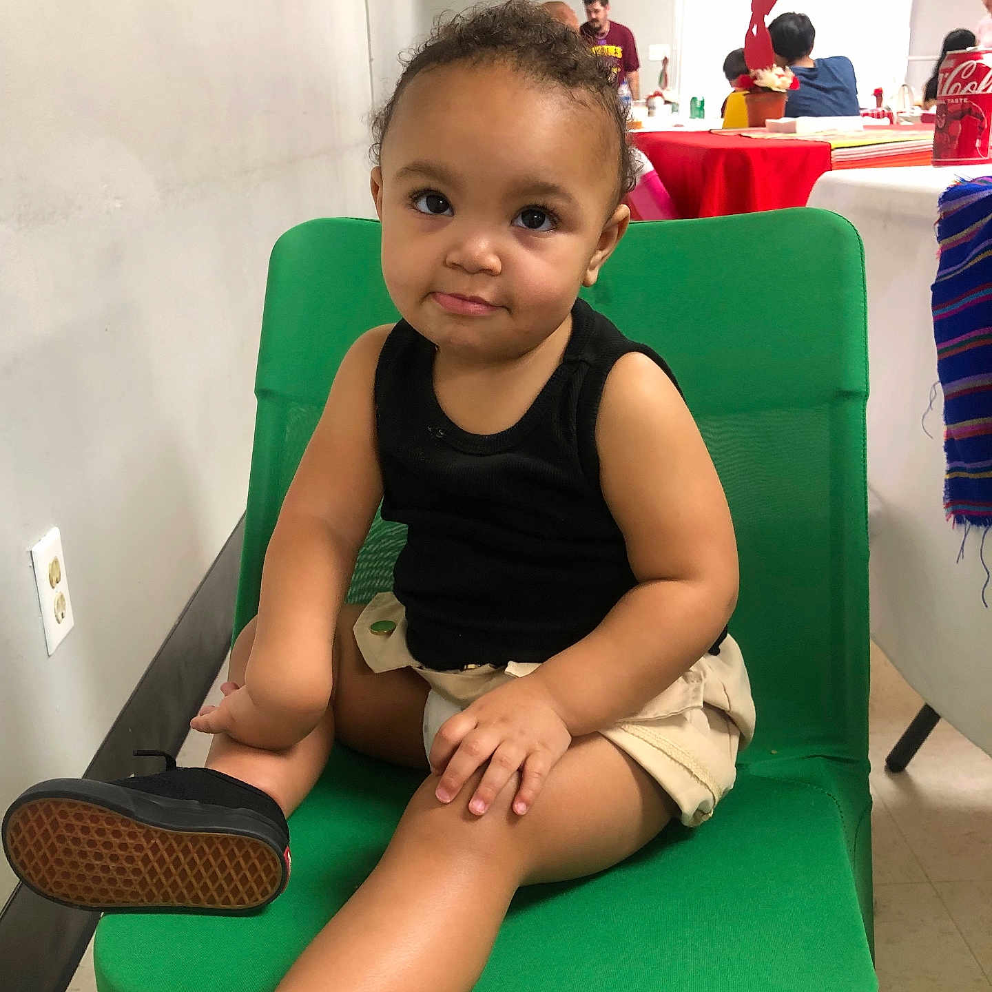 Unique is registered to the contest to win money with this photo: chair, child, clothing, couch, cream, face, female, footwear, furniture, girl, head, indoors, person, photography, portrait, sandal, shoe, shorts, sitting, t_shirt