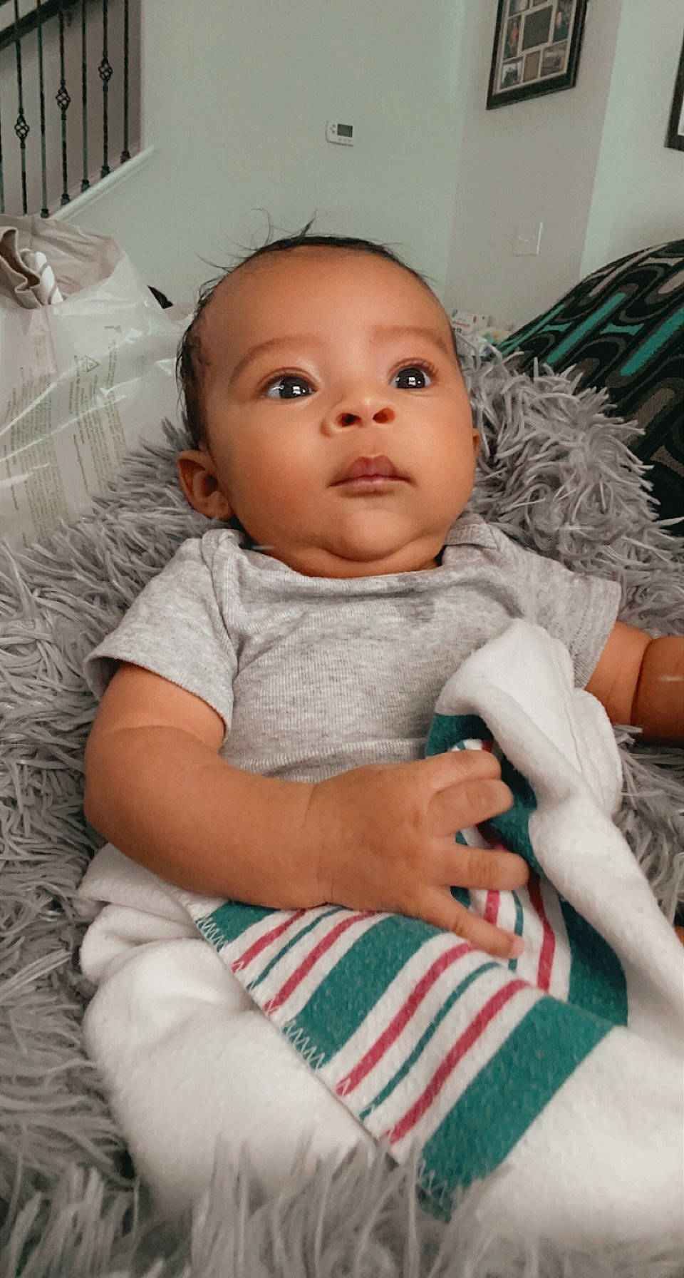 Davion is registered to the contest to win money with this photo: baby, baby_toddler_clothing, cheek, chin, comfort, eye, eyebrow, eyelash, face, finger, hairstyle, head, iris, lip, mouth, nose, person, skin, sleeve, toddler