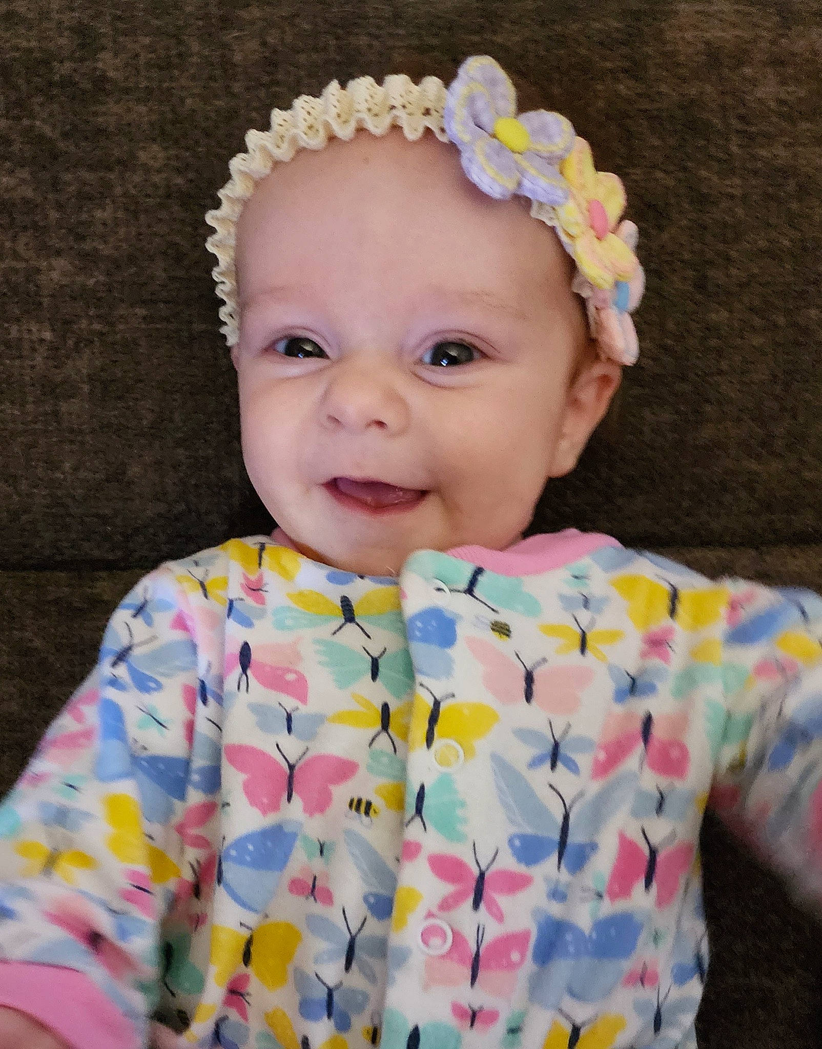 Ashlynn is registered to the contest to win money with this photo: baby_toddler_clothing, cheek, child, clothing, dress, happy, head, headband, headpiece, iris, magenta, neck, pattern, person, pink, plant, skin, sleeve, smile, t_shirt