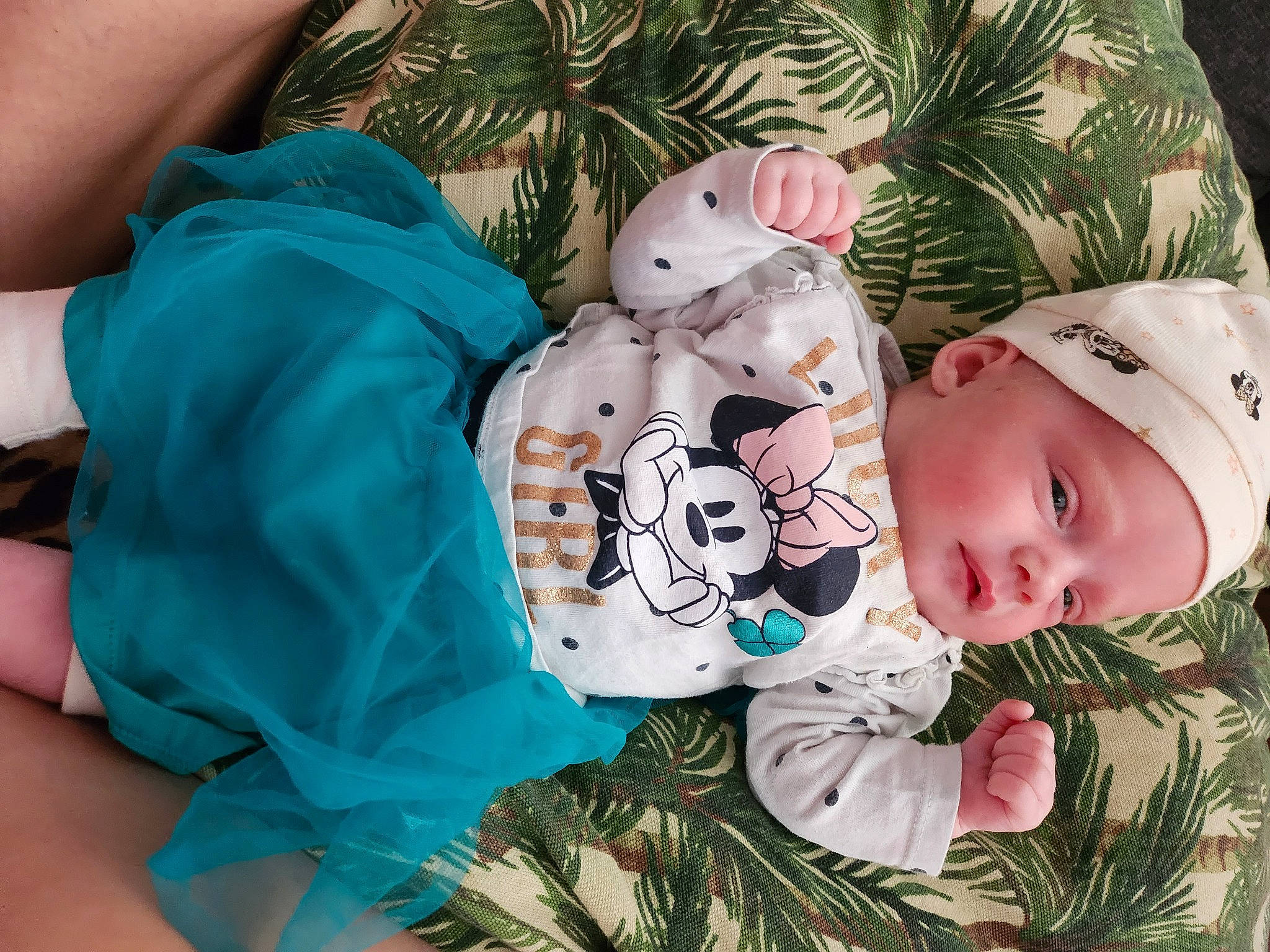 Shayna participe au concours pour gagner de l'argent avec cette photo : baby, baby_toddler_clothing, child, christmas_eve, comfort, foot, fur, grass, happy, hat, head, headwear, holiday, lap, linens, pattern, person, sitting, skin, sleeve
