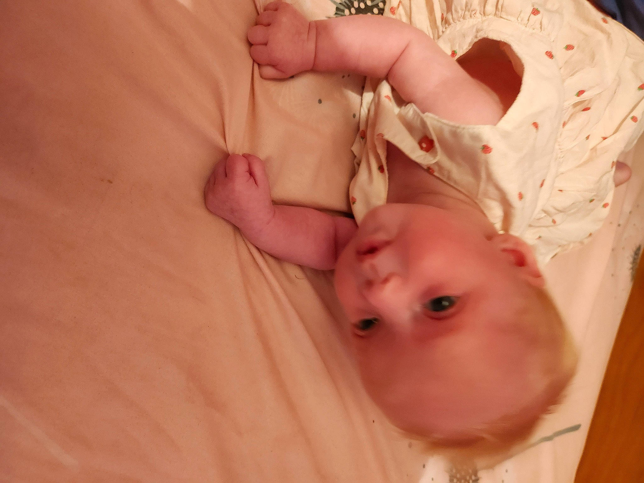 Shayna participe au concours pour gagner de l'argent avec cette photo : baby, baby_toddler_clothing, cheek, comfort, dress, ear, eyelash, finger, gesture, hand, happy, lip, mouth, nail, neck, nose, person, skin, stomach, thumb