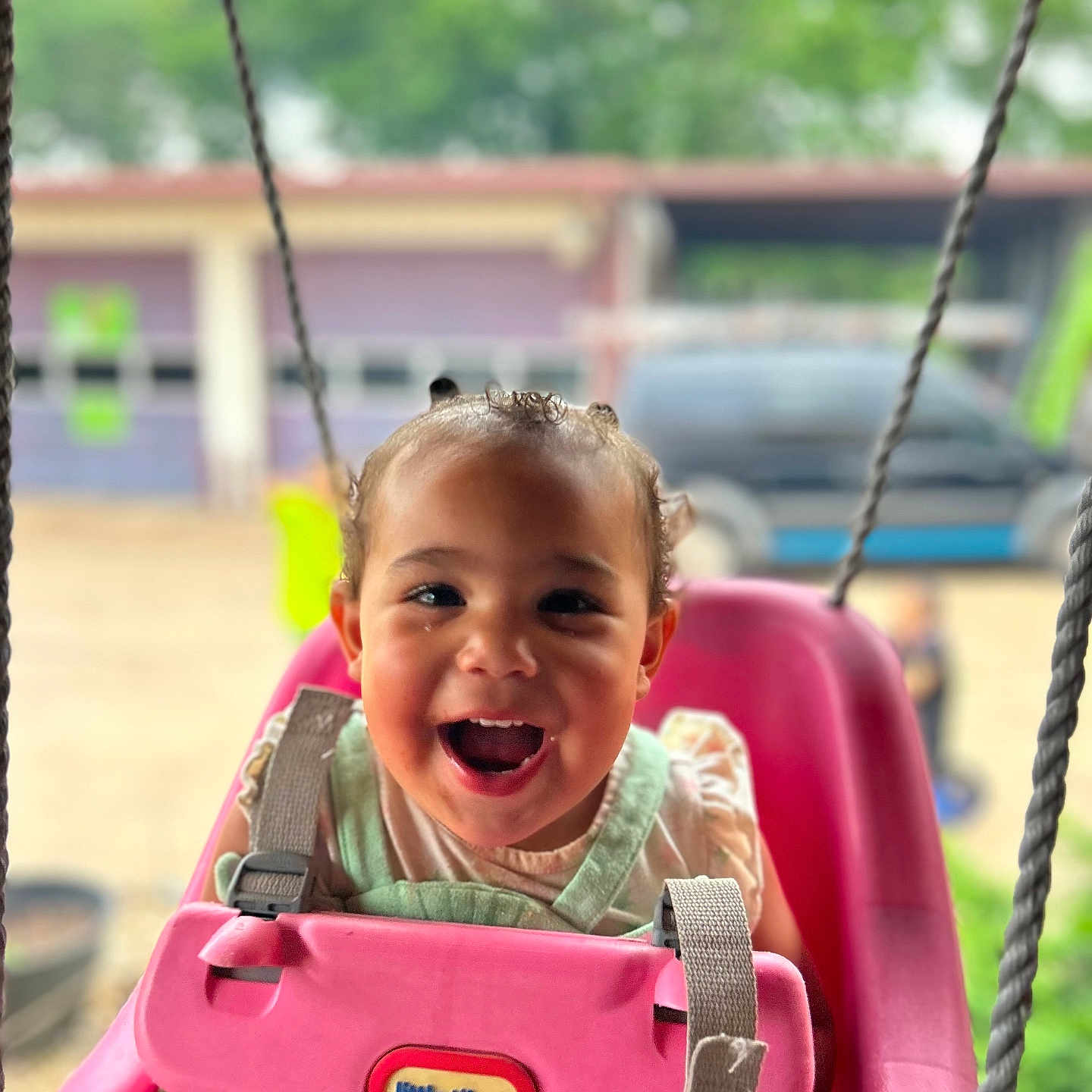 Calliope joined the competition — help win amazing prizes! baby, car, face, grass, happy, head, laughing, nature, outdoorplayarea, outdoors, park, person, photography, plant, playarea, portrait, swing, toy, transportation, vehicle
