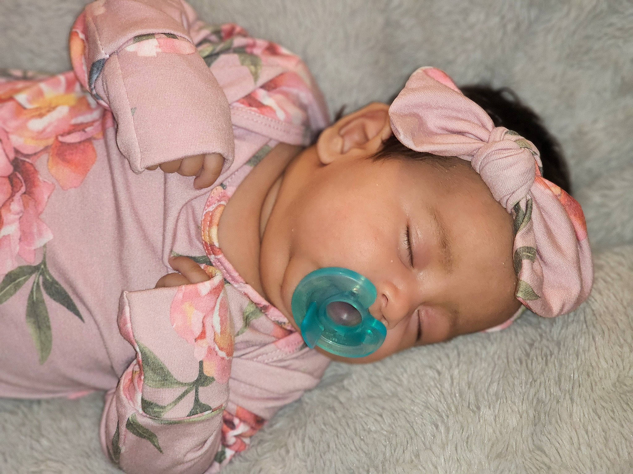 Jolene is registered to the contest to win money with this photo: baby, baby_products, baby_sleeping, baby_toddler_clothing, bedtime, cheek, child, comfort, eye, face, grass, head, headwear, linens, pattern, person, pink, room, skin, textile