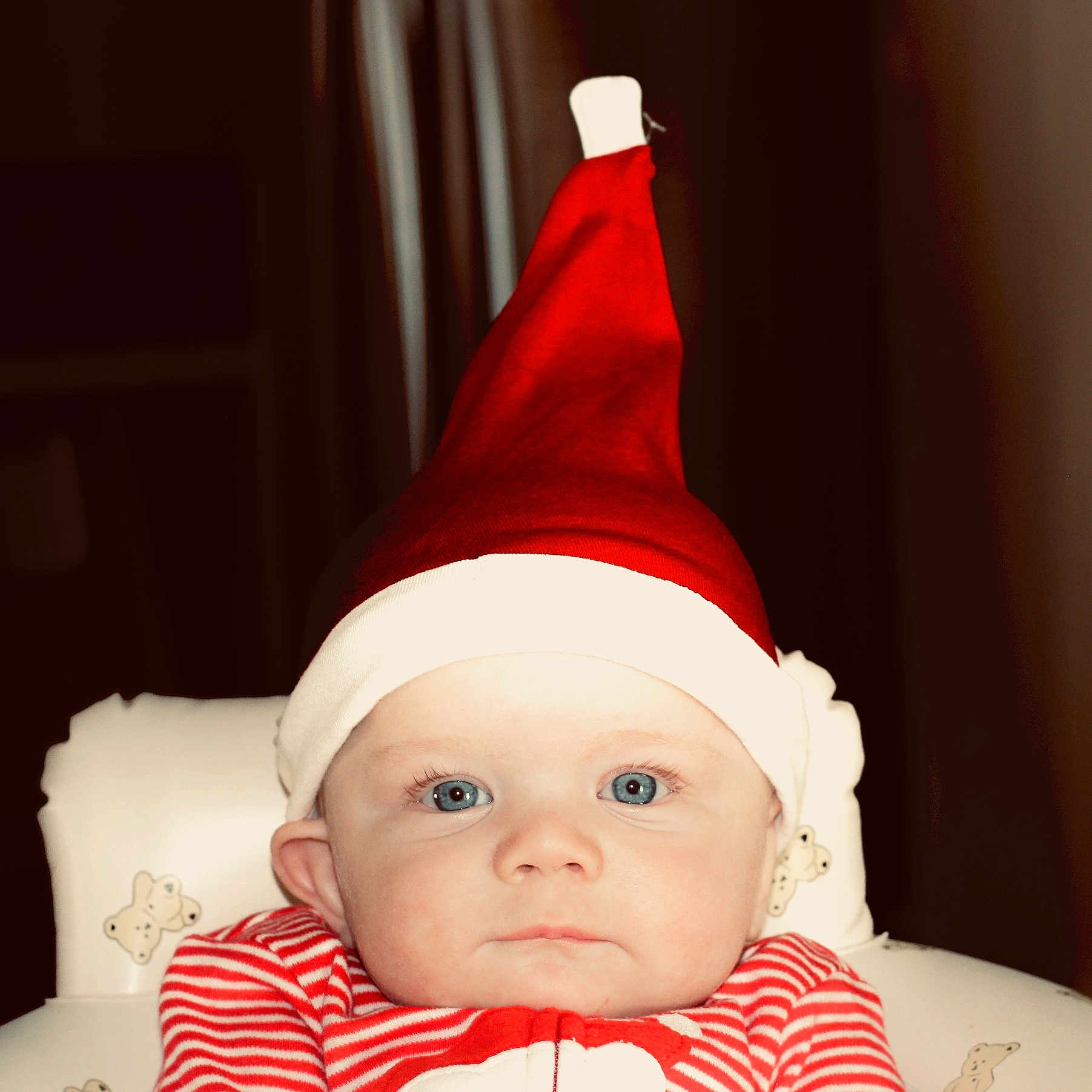 Tatum joined the competition — help win amazing prizes! baby, baseballcap, beanie, bodypart, bonnet, cap, clothing, couch, face, finger, furniture, hand, hat, head, hood, newborn, partyhat, person, photography, portrait