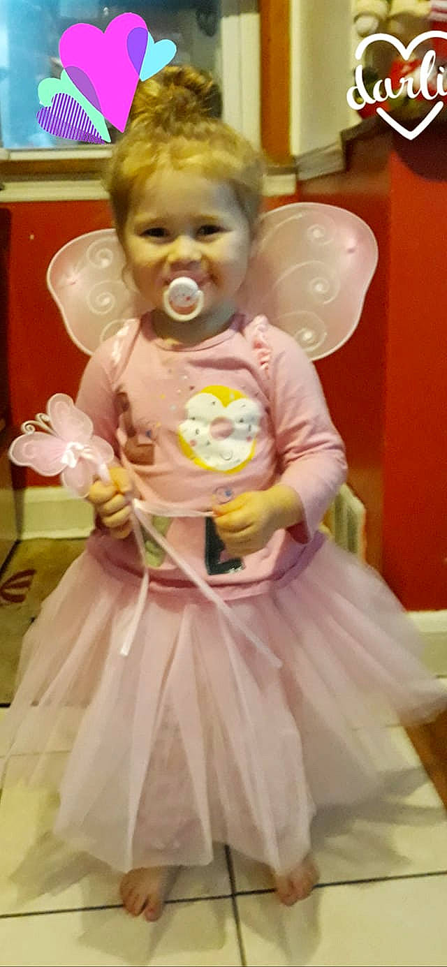 Malaya is registered to the contest to win money with this photo: child, costume, doll, infant, joy, person, toddler, toy