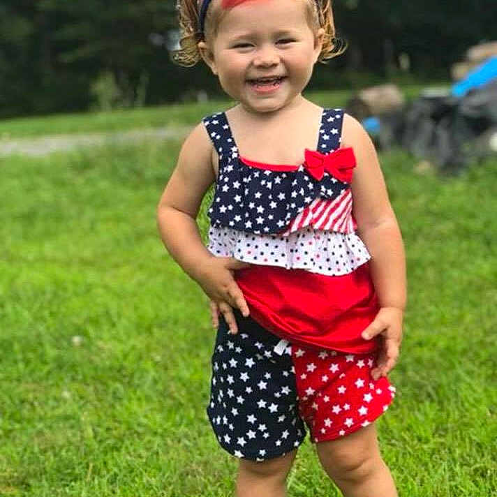 Malaya joined the competition — help win amazing prizes! child, clothing, design, grass, hair_accessory, headgear, joy, pattern, person, pink, play, polka_dot, product, red, shoe, shorts, summer, toddler