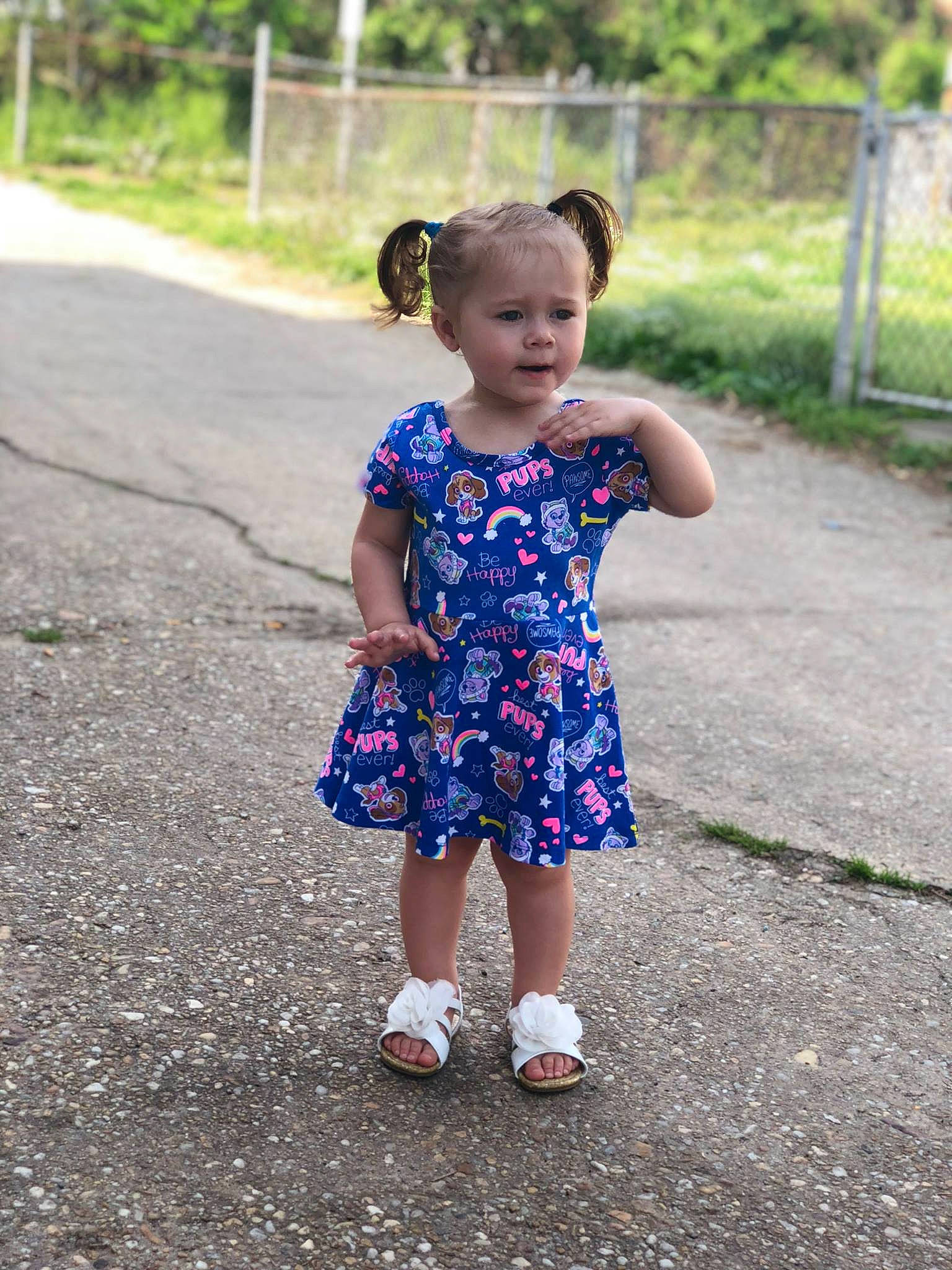 Malaya is registered to the contest to win money with this photo: blue, child, day, dress, facial_expression, fun, girl, happiness, infant, jeans, pattern, person, pink, plant, play, skin, smile, standing, summer, toddler