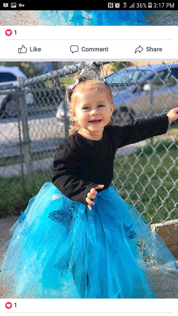 Malaya is registered to the contest to win money with this photo: ballet_tutu, blue, child, costume, dance_dress, dress, fun, girl, gown, hair_accessory, happiness, joy, outerwear, person, smile, toddler
