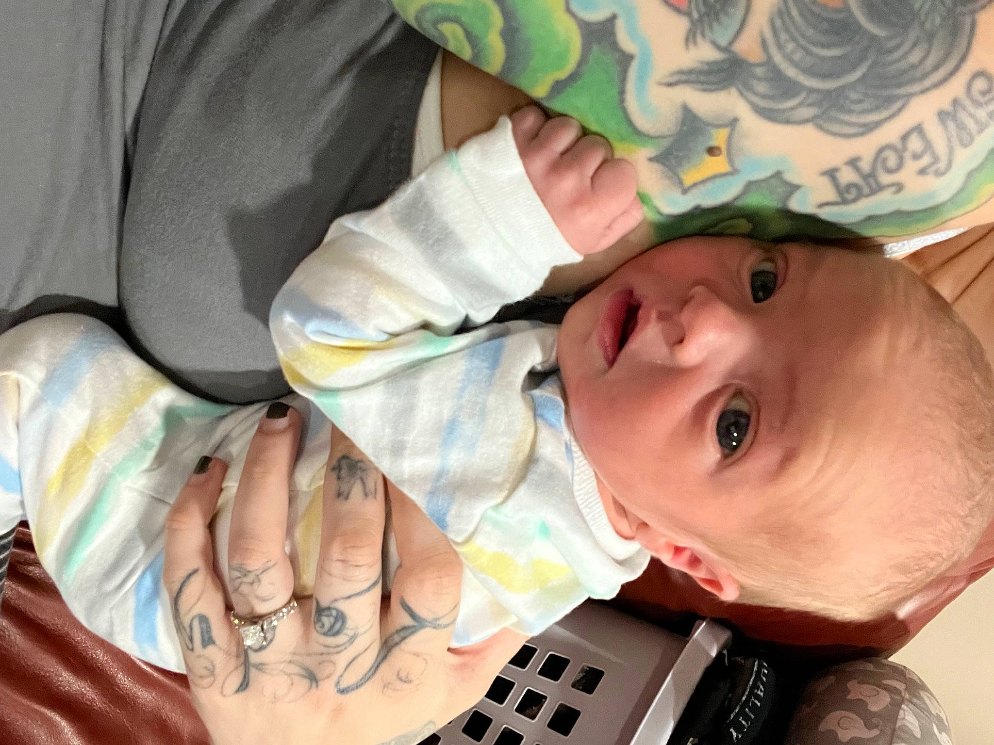 Emmitt is registered to the contest to win money with this photo: baby, baby_toddler_clothing, cheek, child, close_up, comfort, eye, eyelash, facial_expression, finger, gesture, hand, happy, mouth, nail, person, skin, thumb, toddler, white