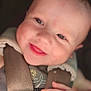 Tulsyn is registered to the contest to win money with this photo: baby, child, smile, face, hand, car_seat, seatbelt, infant, closeup, cute, happiness, young, skin, safety, child_seat, baby_clothing, portrait, small_hand, secure, bright_eyes