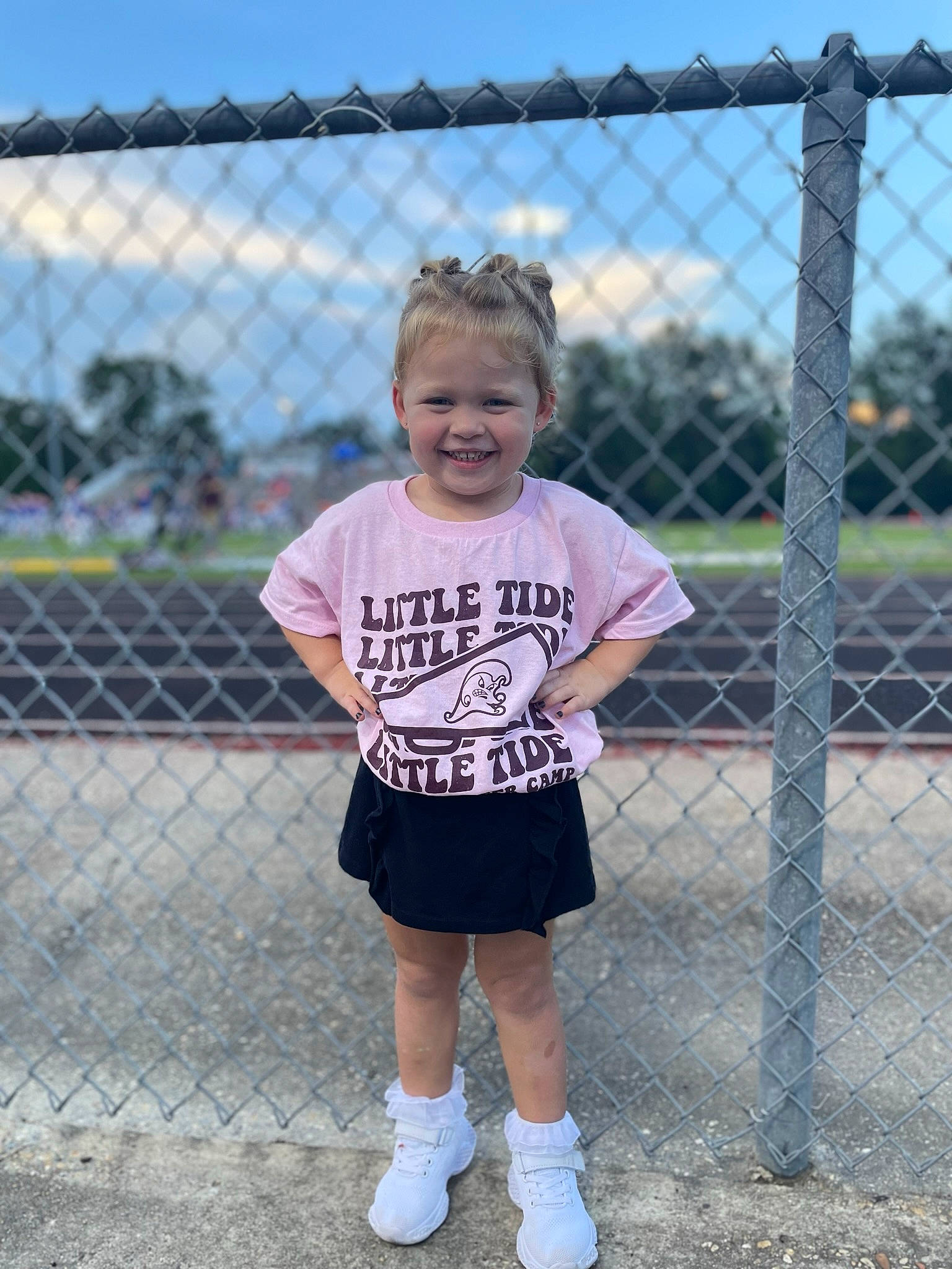 Katherine joined the competition — help win amazing prizes! chain_link_fencing, electric_blue, fence, fun, human_leg, jersey, joy, knee, leg, mesh, pattern, person, recreation, shorts, sky, sleeve, smile, sock, t_shirt, thigh