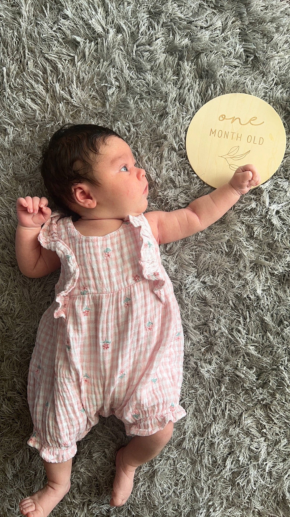 Amelia is registered to the contest to win money with this photo: arm, baby, baby_toddler_clothing, facial_expression, finger, flash_photography, gesture, grass, hand, happy, human, human_body, nose, organ, people_in_nature, person, skin, sleeve, standing, thumb