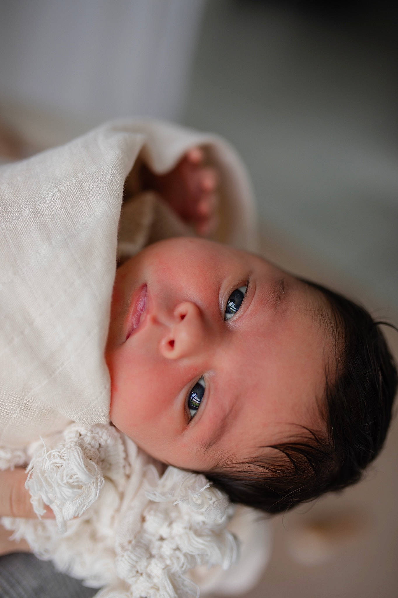 Amelia is registered to the contest to win money with this photo: baby, baby_toddler_clothing, cheek, child, comfort, ear, embellishment, eyelash, flash_photography, fur, happy, human_body, linens, lip, nose, person, portrait_photography, room, skin, toddler