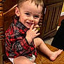 Brody Dean joined the competition — help win amazing prizes! toddler, child, smiling, plaid_shirt, sock, diaper, wooden_chair, furniture, indoor, floor_tile, cute, happy, person, baby, face, hand, leg, foot, skin, expression