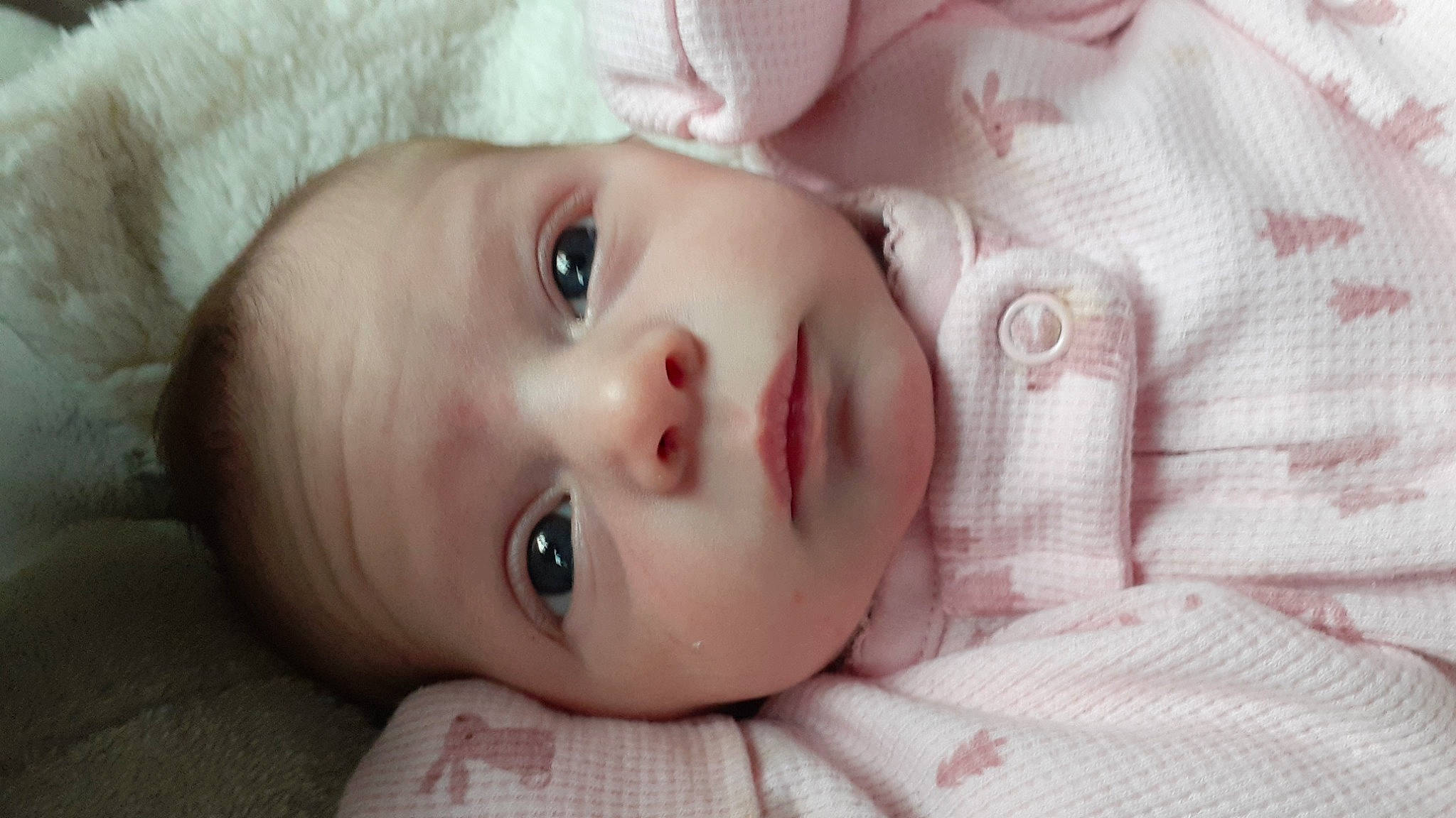 Karma is registered to the contest to win money with this photo: baby, baby_toddler_clothing, cheek, child, chin, close_up, ear, eyebrow, eyelash, forehead, human_body, iris, lip, mouth, nose, person, pink, product, skin, sleeve