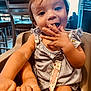 Alorah joined the competition — help win amazing prizes! toddler, child, high_chair, indoor, snack, hand, face, smiling, daisy_pattern, clothing, seatbelt, window, chair, furniture, cute, happy, casual, baby, person, mouth