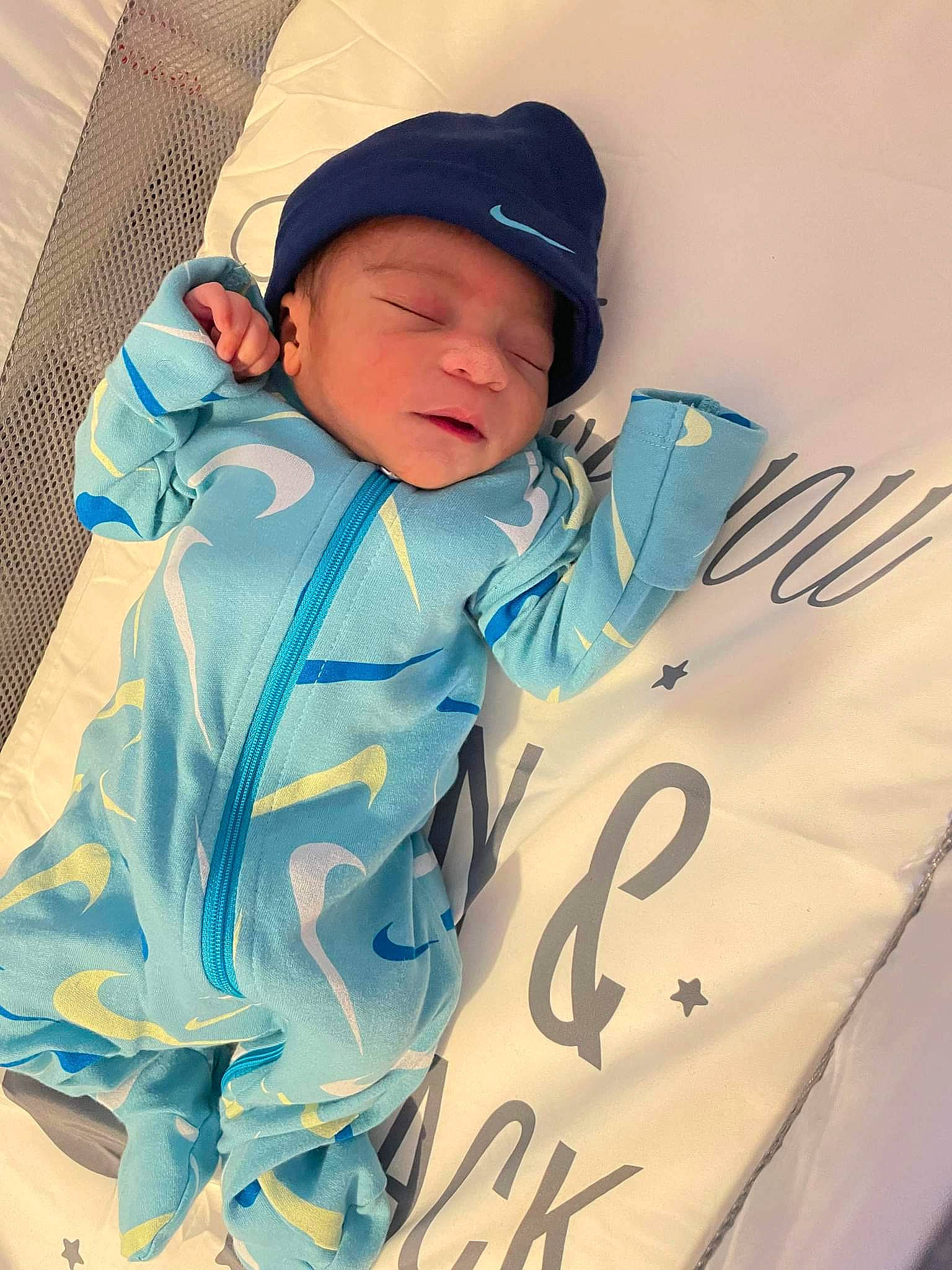Braylen is registered to the contest to win money with this photo: azure, baby, baby_products, baby_toddler_clothing, baseball_cap, cap, cheek, child, comfort, electric_blue, fashion_accessory, fun, gesture, happy, headwear, hoodie, pattern, person, sleeve, t_shirt