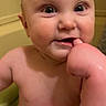 Alex is registered to the contest to win money with this photo: baby, child, face, finger, bath, bathtub, water, skin, expression, playful, cute, indoors, person, infant, chewing, hand, young, sitting, bathroom, happy