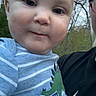 Alex joined the competition — help win amazing prizes! baby, child, portrait, closeup, striped_shirt, dinosaur_graphic, text_on_clothing, outdoor, trees, sky, glasses, adult, person, face, head, cheeks, clothing, holding, nature, casual