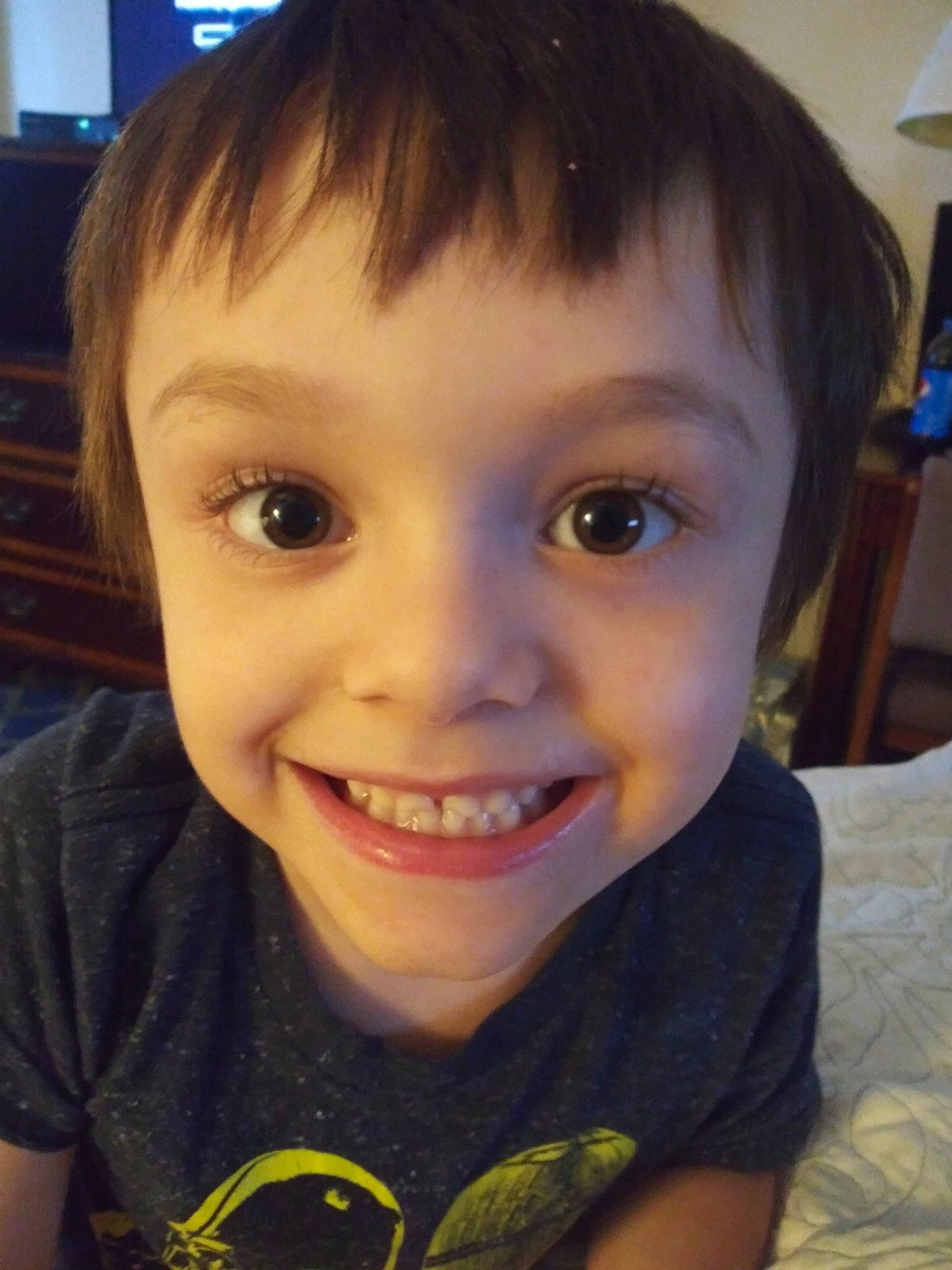 Trevor is registered to the contest to win money with this photo: cheek, child, chin, eye, eyebrow, face, facial_expression, forehead, hair, hairstyle, head, iris, jaw, joy, lip, nose, organ, person, selfie, skin