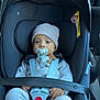 Ilyes participe au concours pour gagner de l'argent avec cette photo : baby, baby_clothes, black_car_seat, car_interior, car_seat, child, closeup, clothing, cute, feet, hands, hat, indoors, infant, knitwear, pacifier, safety, seatbelt, straps, transportation