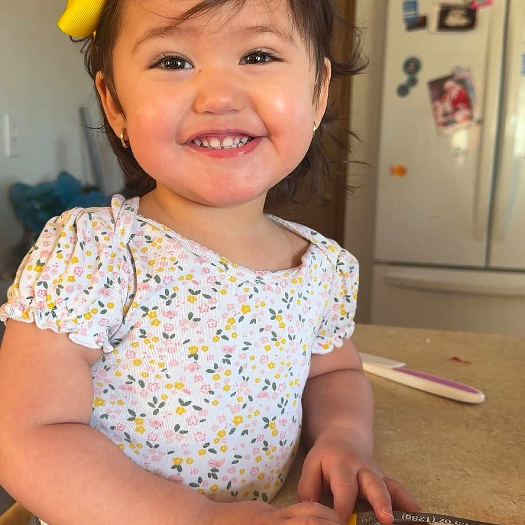 Genyxis joined the competition — help win amazing prizes! accessories, advertisement, baby, bodypart, clothing, cutlery, device, face, furniture, happy, head, indoors, mouth, person, photography, portrait, smile, t_shirt, table, teeth