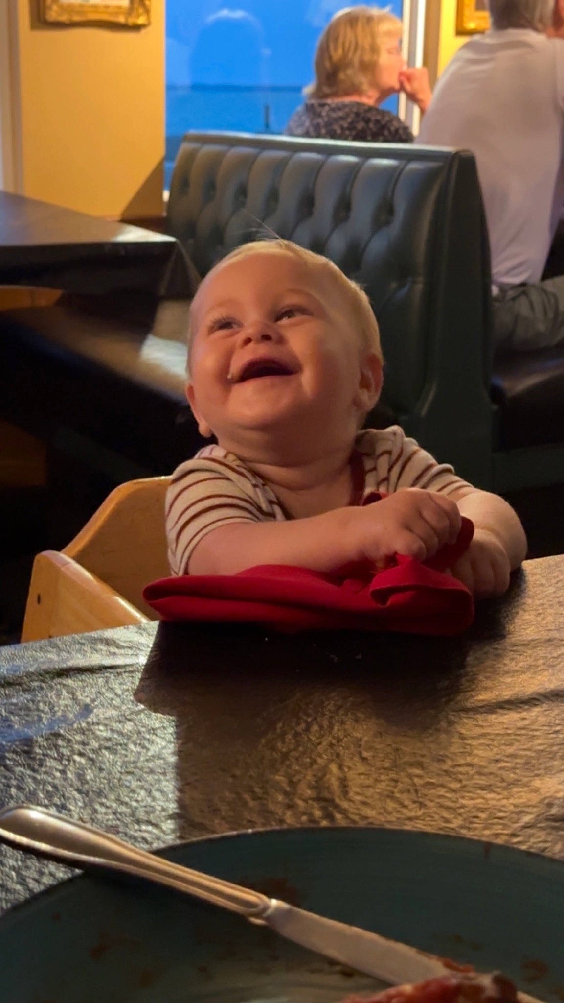 Cohen is registered to the contest to win money with this photo: baby, baby_laughing, baby_toddler_clothing, carmine, cheek, child, comfort, flooring, fun, happy, hardwood, joy, laugh, leisure, person, room, sitting, smile, tableware, toddler